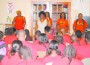 Opa-locka Teen Upward Bound Director Jannie Russell gives instructions to students, at the Children’s Defense Fund (CDF) Freedom School during Harambee (a group-affirming celebration/preparation for the work ahead).