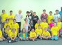 City of Homestead’s Parks and Recreation Resource and Events Coordinator Eric Weiss and Recreational Leader Tommy Deloach are pictured with the lucky campers who were able to attend NBA superstars Alonzo Mourning and Dwayne Wade’s Summer Groove Basketball Clinic.