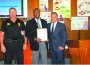 Homestead Police Department’s K-9 Lt. Tommy Pritchett, City of Miami Detective and Homestead resident Saens Dorcely , and City of Homestead Mayor Steven C. Bateman and Council recognize Det. Dorcely for his brave actions in helping a neighbor in need.