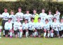 Palmer Trinity School Boys’ Varsity Soccer team with the soccer balls they donated in Homestead.