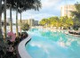 Enjoy relaxing at the lagoon pool at Crowne Plaza Hollywood Beach before boarding the South Beach Express Water Taxi