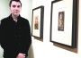 Eddy Lopez is shown with his eight-color linoblock print, Birmingham (Paki), a reduction block technique, with full, rich, resonant shades of chocolate brown, black and cream.