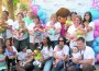 Kendall Regional Medical Center physicians and staff are pictured with some of the NICU babies in attendance at the first anniversary celebration of the hospital’s Level II NICU.