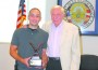 Luke Plesa (left) receives Joe Borrell award