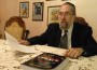Rabbi Hershel Becker is pictured in his study with his new book, Love Peace: Blueprints For Lasting Relationships.