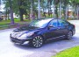 Hyundai Genesis grille has been enhanced for 2012 and the headlights have been redesigned with the addition of LED accents and daytime running lights.