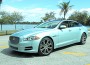 Jaguar XJ has a sleek coupe-like profile, a lithe stance and a standard full-length panoramic glass roof.