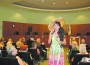 Lourdes entertains the crowd with an old-time favorite.