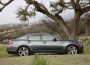 Infiniti M has a sporty, aerodynamic look, with a long, low hood and a high rear deck.