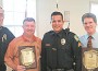 Pictured (l-r) are retiring Pinecrest Police Chief John Hohensee, honoree Roger Huxman, Sgt. Ivan Osores and honoree Larry Michelson