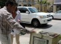 Brandon Lurie points out the downtown streets in a state of disrepair