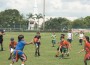 Youngsters get exercise by playing flag football.