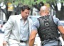 Mark Wahlberg is pictured after jumping off the second- floor balcony at City Hall.