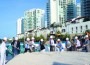 Current and former commissioners turn over shovels of sand to officially break ground for the new Gateway Park at 151 Sunny Isles Boulevard.