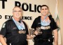 Pictured (l-r) are Pinecrest police officers Robert Noyer and Phil Martin with their 10 Police Olympics Gold Medals and trophies.