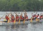 Employees practice paddling skills to prepare for their participation in the Annual Dragon Boat Race at Haulover Park on September 29th.