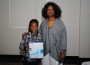 Marissa Greene (left) won a water filter when Commissioner Tydus pulled her
ticket during the raffle.