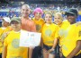 Miami Marlins president David Samson celebrates becoming “Bald, Brave, Beautiful” with Miami Children’s Hospital’s Camp UOTS participants before the game