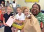 Volunteers deliver 125 Thanksgiving baskets to S. Dade families in need