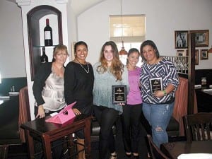 Interns Raquel Hernandez (left) and Joslyn Fabian were presented plaques by (l-r) Mercy Hernandez, Priya Nembhard and Irma Gomez. (Not present was intern Yesenia Gutierrez.)