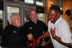 Enjoying a laugh at the grand opening of the Kendall Shula Burger are (l-r) former Dolphins Coach Don Shula,Shula Burger president Scott Nietschmann, and Dolphins Alumni president Nat Moore.