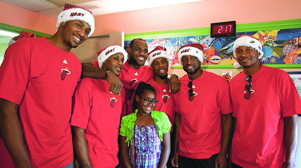 Heat players share holiday spirit with young patient Heat players share holiday spirit with young patient