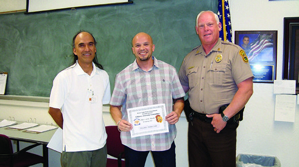 Kendall detective earns honors with arrest of violent suspect Kendall detective earns honors with arrest of violent suspect