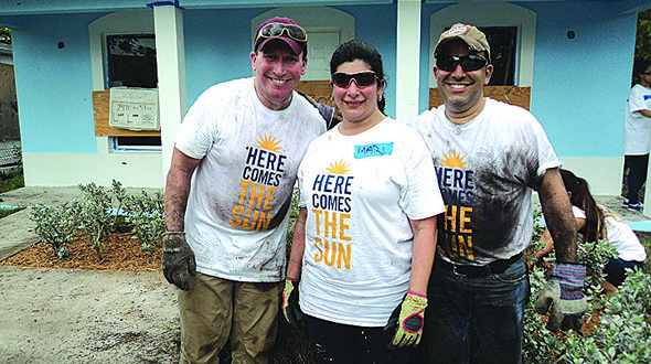 Home Financing Center employees pitch in for Habitat for Humanity Home Financing Center employees pitch in for Habitat for Humanity