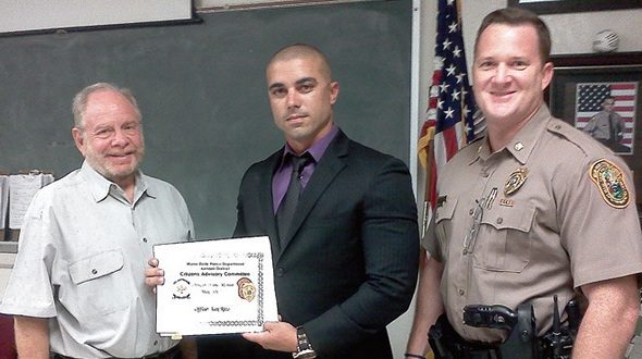 Kendall officer honored for lifesaving efforts Kendall officer honored for lifesaving efforts