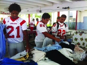 Ponce Society’s shirt, tie event benefits CGHS football players