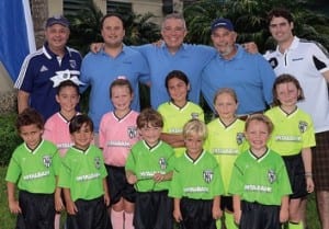 Pictured are (front row l-r) Atef Musa, Carlos Figueroa, Kevin Fitzgerald, Cameron Correoso, Aidan Cullen; (middle row l-r) Tatiana Christin, Elizabeth Butler, Nina Chantres, Dylan Maier, Olivia Lane; (back row l-r) Total Bank officers Renato Salazar, Nelson Hidalgo, Luis de la Aguilera, Ramon Ferran and Juan Rovira.