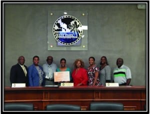 City Award Scholarship presented to Students at City Commission Meeting. (Pictured from Left to Right): Commissioner Thomas Dorsett, Vice Mayor Felicia M. Brunson, Mayor Eric H. Jones, Student Recipient Ms. Gisla Bush, Commissioner Rita Mack, Chair of the Education Advisory Committee (EAC) Ms. Lisa Mays, (EAC) Vice Chair Ms. Dominique Dumervil, and (EAC) Committee member, Mr. Ronald Bell. 