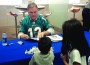 Bob Griese signs autographs for fans at new AT&T Store