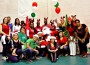 Employees from Interval International, headquartered in South Miami since 1976, gather at the Gibson Bethel Community Center for the company’s annual toy drive. Nearly 350 children received holiday gifts.
