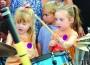Youngsters get an up-close look at musical instruments during last year’s event.