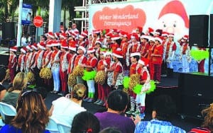 Performers from several local schools get into the holiday spirit.