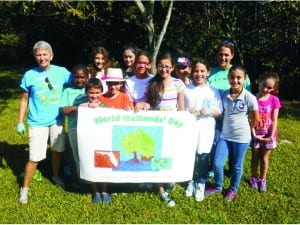Whigham Elementary students work to help clean up the coast