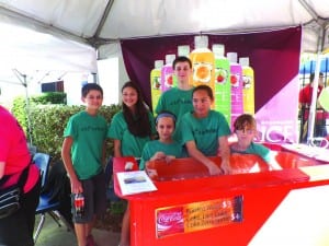 Enjoying the last day of the Coconut Grove Art Festival are (l-r) Christina Burns, Monty Trainer, Belinda and Scott Sime