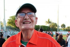 STILL ON THE JOB: Mark Light Field usher Hap Pate, 82 stands proudly in front of his seating sections during Miami’s game on Saturday night. HALLEE MELTZER// PHOTOGRAPHER