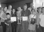 Los ganadores con sus padres y hermanos