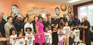 Miami Heat owner Micky Arrison, NBA Comm. Adam Silver and Miami- Dade County Mayor Carlos Gimenez cut the ribbon at the new Learn & Play Center.