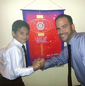 Future Rotarian Logan De Armas with his dad, Gabriel De Armas, at South Miami Rotary Installation Dinner.