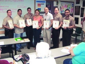 Hammocks District officers honored for capturing suspect in homicides