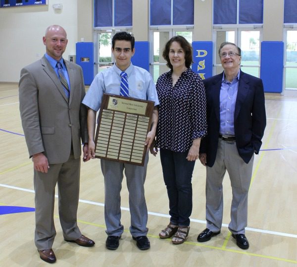 Divine Savior Academy Principal Ben Troge, DSA Senior Christian Rodriguez, Christian's Parents Maite Casas and Pedro Rodriguez