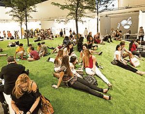 PEOPLE SITTING AT ART BASEL