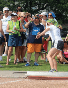 Jamie throwing during the Shot put competition