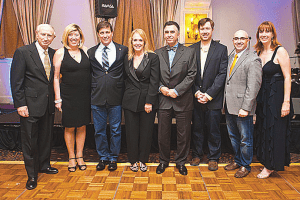 Pictured (l-r) are Junior Orange Bowl presidents, past and present, Robert Berman, Jeannett Slesnick, William Kerdyk Jr., Barbara Waters, Rex Russo, Don Slesnick III, Peter Tolmach and Kathleen Kauffman.